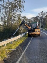 Reach arm mower